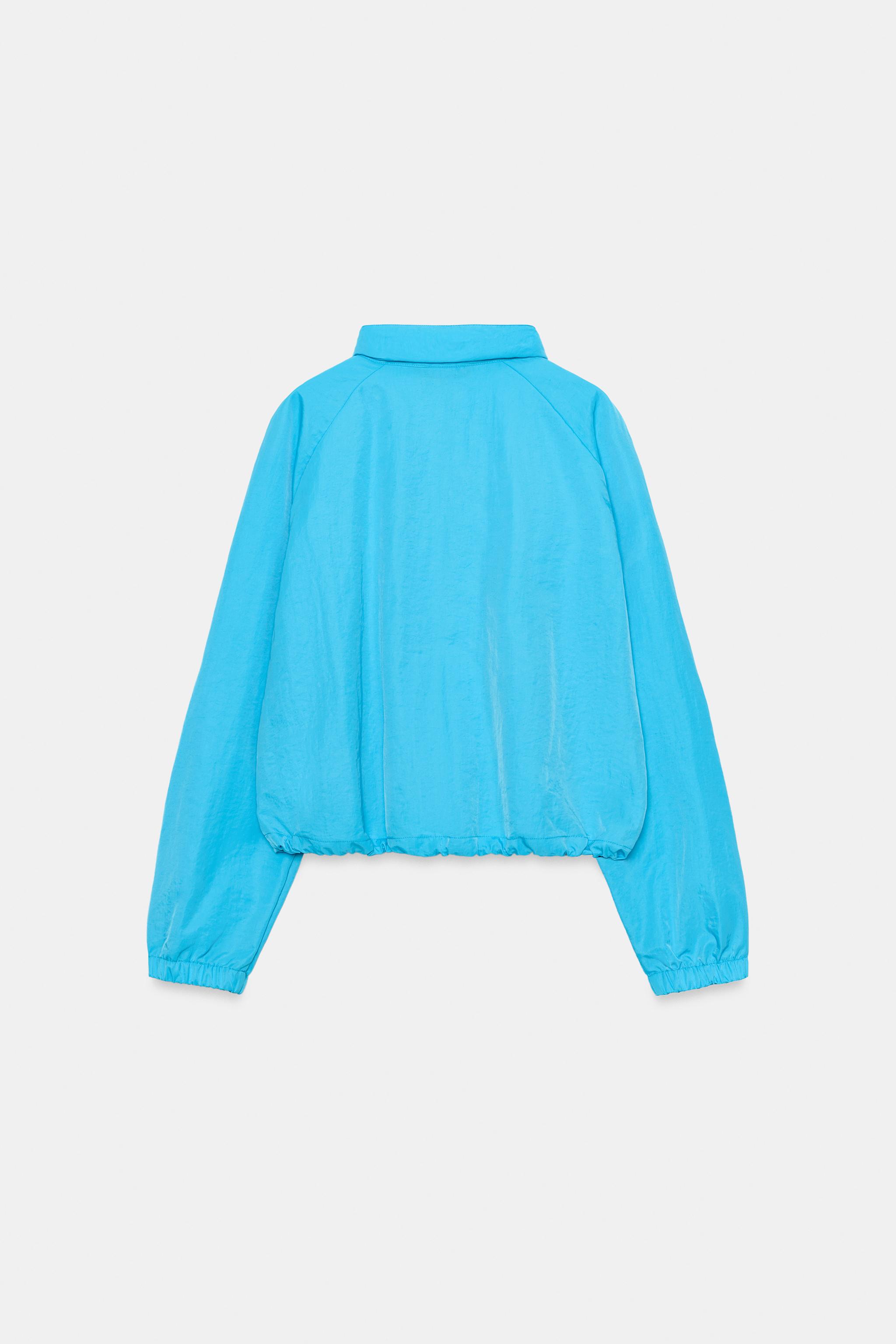 VESTE EN TISSU TECHNIQUE ZIPPÉE